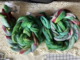 Shades of green and red grace this beautiful Finn roving